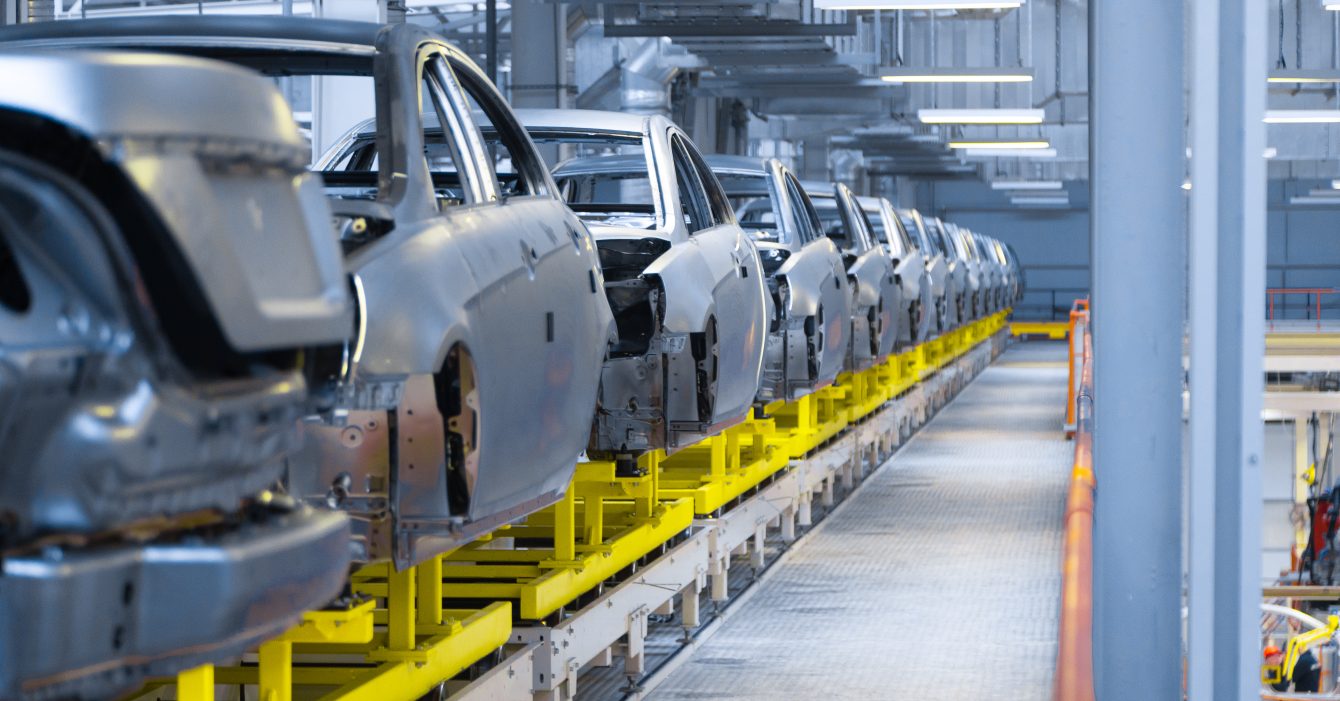 Movement of vehicles along the production line at the plant. Car Assembly shop. Car Assembly by parts Movement of vehicles along the production line at the plant. Car Assembly shop. Car Assembly by parts