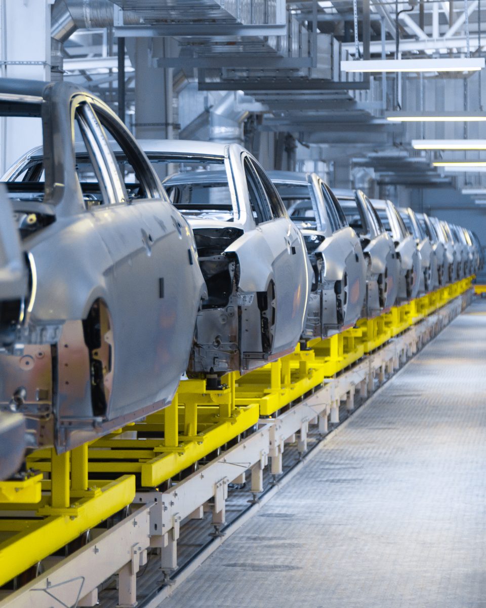 Movement of vehicles along the production line at the plant. Car Assembly shop. Car Assembly by parts
